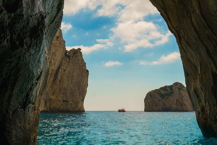 Capri Private Gozzo Boat Tour — Blue Grotto, Faraglioni & Swim