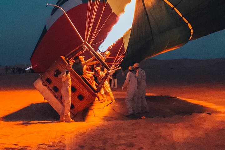 Sunrise Hot Air Balloon Over Dubai Desert — Falcons, Breakfast & Flight