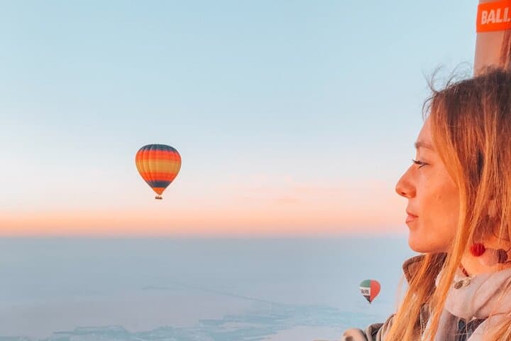 Dawn Desert Hot Air Balloon Over Dubai: Sunrise Flight & Falcon Experience