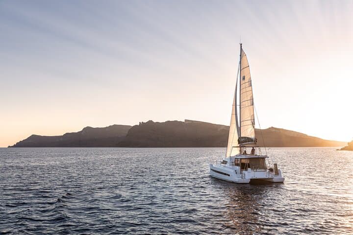 Half-Day Catamaran Cruise Around Santorini: Volcano, Hot Springs & Red Beach photo 2