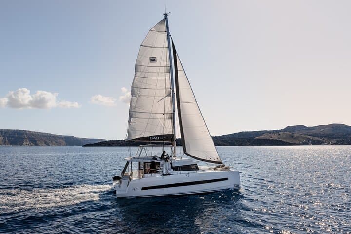 Half-Day Catamaran Cruise Around Santorini: Volcano, Hot Springs & Red Beach photo 6