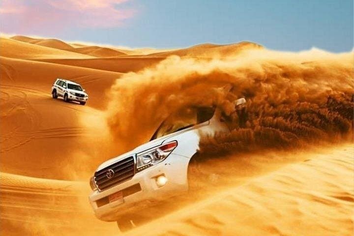 Dubai Red Dunes Premium Desert Safari with BBQ Dinner & Belly Dance photo 2