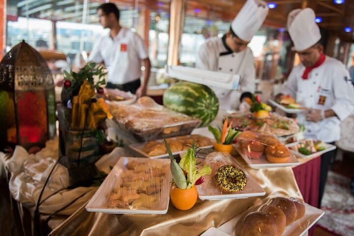 Moonlit Dhow Dinner Cruise on Dubai Creek — Traditional Buffet & Heritage Sail photo 4