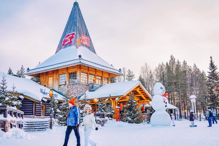 Day Trip to Santa Claus Village from Levi: Arctic Circle Photos, Snowman World & Reindeer Encounters photo 2