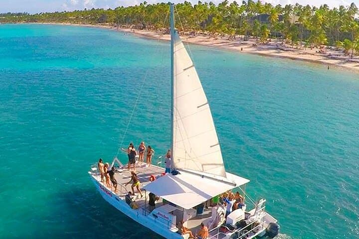 Cap Cana Party Catamaran to Palmilla Natural Pool: Shared Sunrise & Sunset Cruise