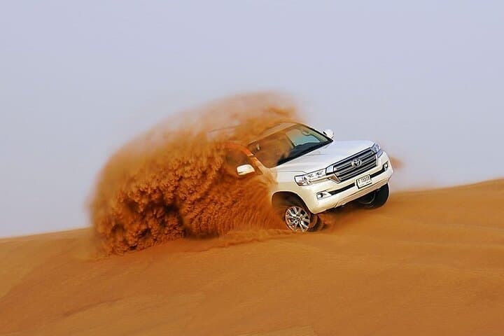 Lahbab Desert Safari Dubai: Dune Bashing, Sandboarding & Starlit Buffet