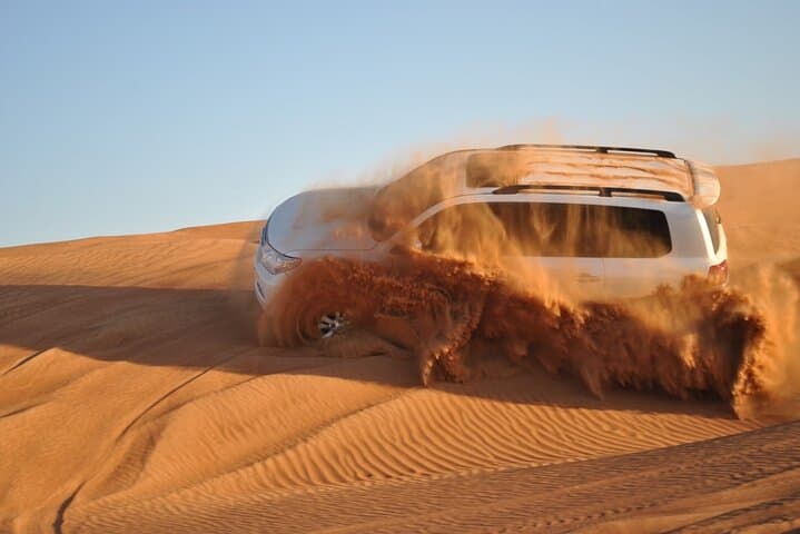 Red Sand Desert Quad Bike Safari with Camel Ride & BBQ Dinner — Dubai Evening Adventure