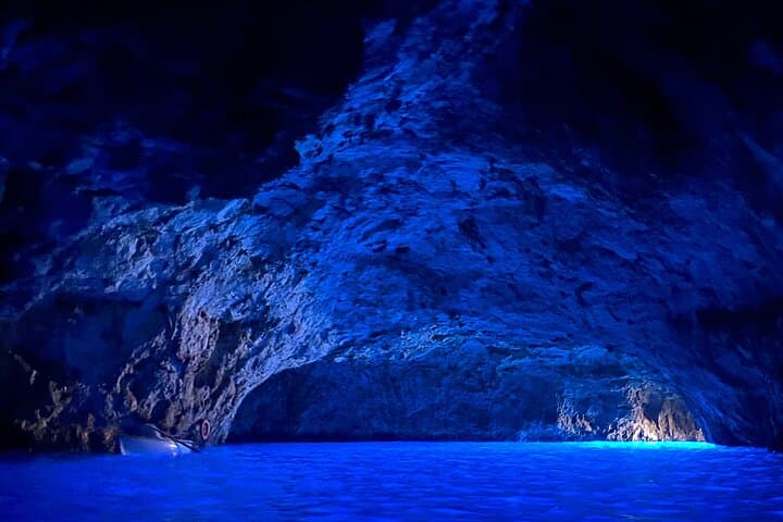 Capri Boat Tour: Explore Faraglioni, Blue Grotto & Coastal Caves photo 2