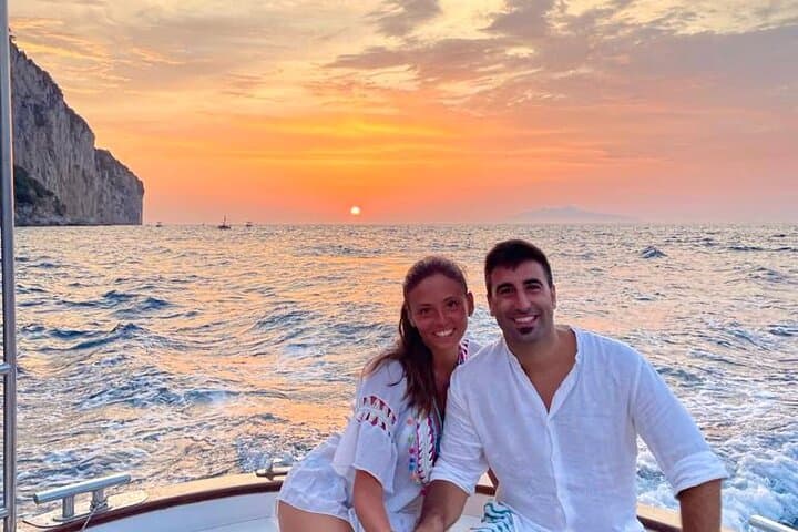 Capri Sunset Gozzo Cruise: Aperitif, Caves & Faraglioni Evening Tour