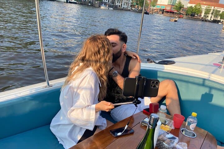Private 90-Minute Amsterdam Canal Cruise with Live Guide & Drinks photo 3