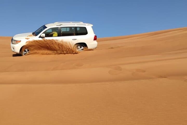Sunrise Desert Safari Dubai: Private Dune Bashing, Camel Ride & Breakfast photo 2