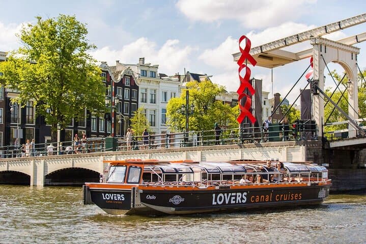 Amsterdam 1-Hour Solar Canal Cruise: Semi-Open Boat with Multilingual Audio Guide