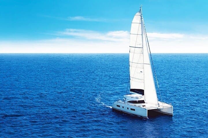 Private Catamaran Cruise to Ile aux Cerf from Pointe Jerome — Full-Day Snorkel & Waterfall Excursion photo 2