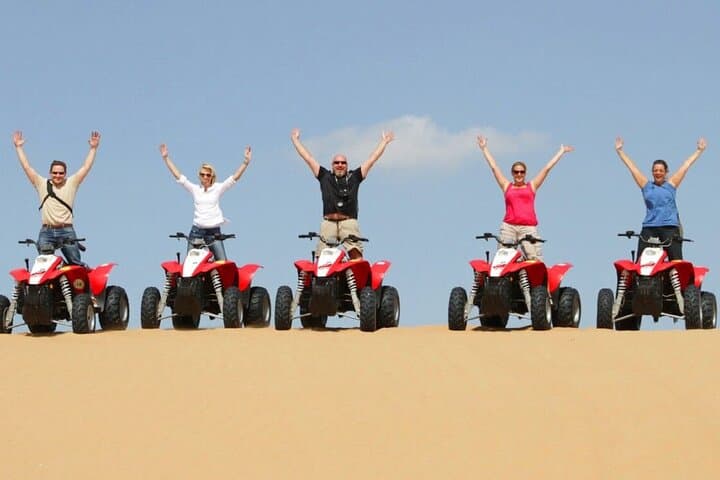 Evening Dubai Desert Safari: 1-Hour Quad Bike, Dune Bashing & Live BBQ photo 1