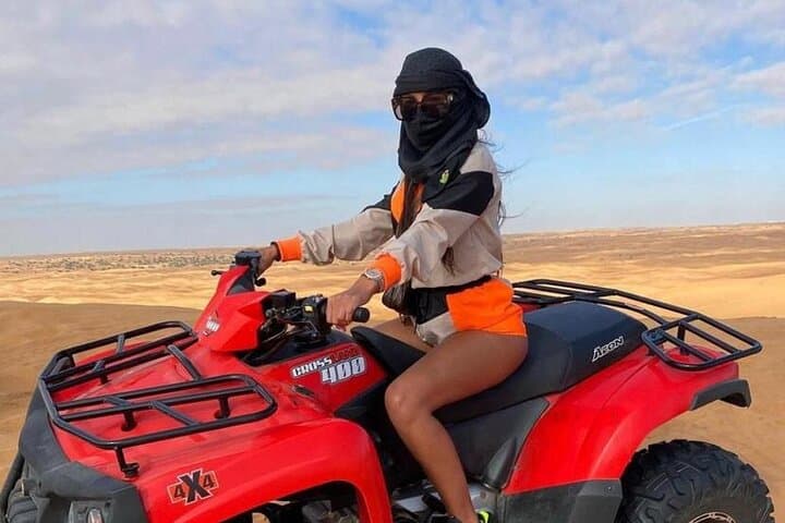 Evening Dubai Desert Safari: 1-Hour Quad Bike, Dune Bashing & Live BBQ photo 2