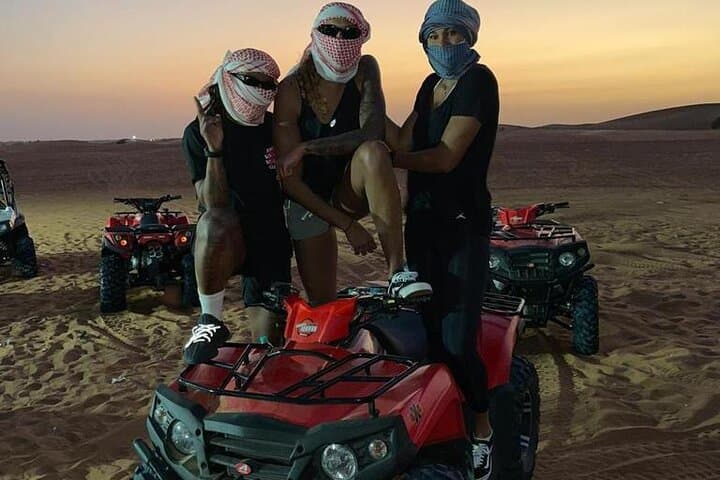 Evening Dubai Desert Safari: 1-Hour Quad Bike, Dune Bashing & Live BBQ photo 4