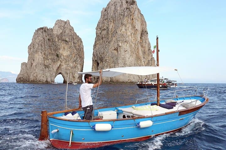 Capri Private Boat Tour: 4-Hour Gozzo Cruise to Blue Grotto & Faraglioni photo 4