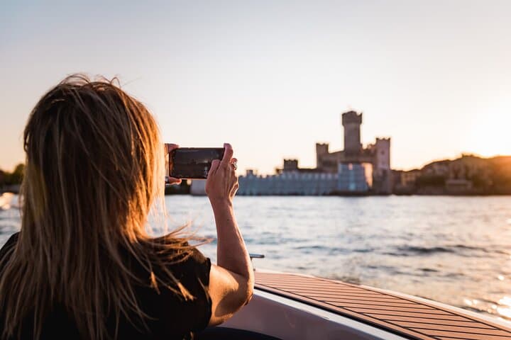 Lake Garda Sunset Cruise from Sirmione: Prosecco, Roman Ruins & Castle Views photo 1