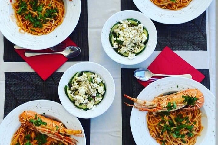 Private Mykonos Yacht Tour: Kalafatis to Rhenia with Swimming, SUP & Lobster Lunch