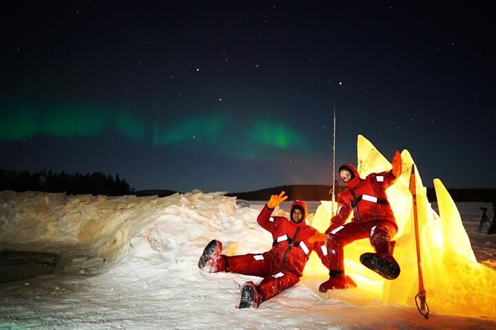 Ice Floating on a Forest Lake Under the Aurora Borealis in Rovaniemi