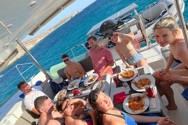 Private Mykonos Yacht Tour: Kalafatis to Rhenia with Swimming, SUP & Lobster Lunch photo 5