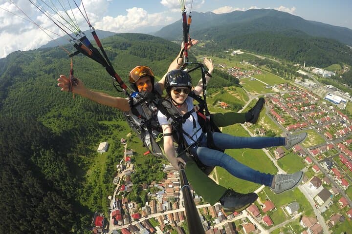 Tandem Paragliding from Postăvaru Peak — Poiana Brașov Cable-Car Flights photo 1