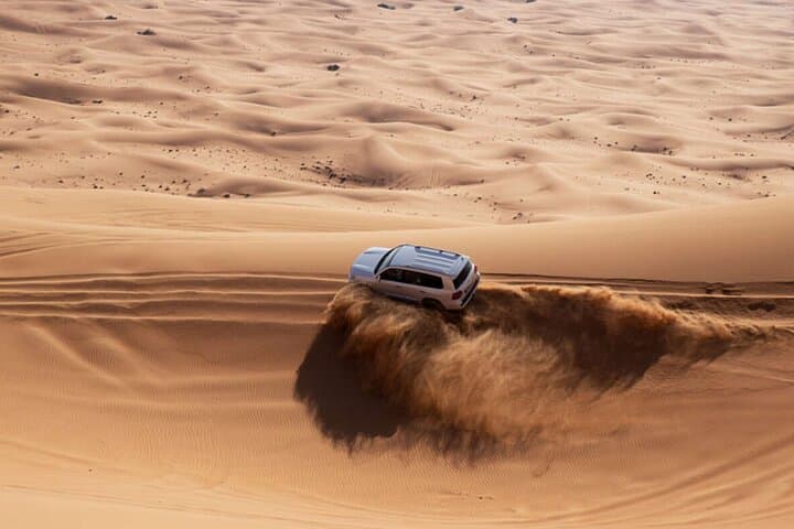 Private Morning Desert Safari in Dubai — Camel Ride, Sandboarding & Dune Bashing photo 3