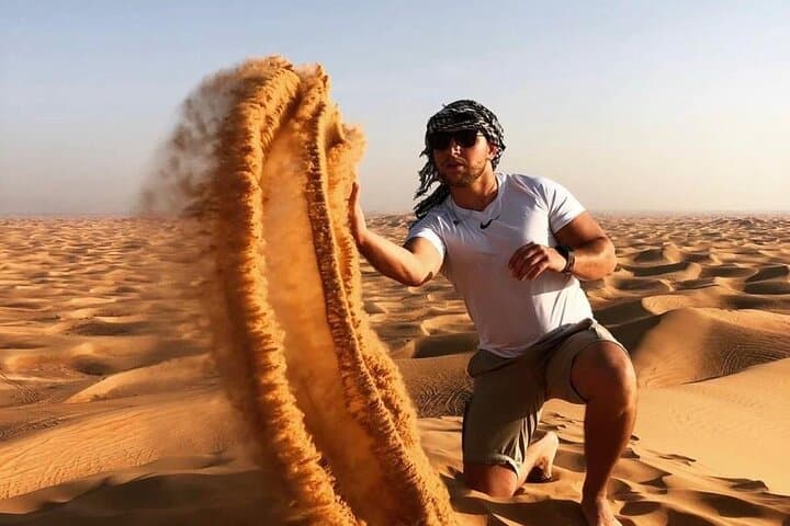 Dubai Red Dunes Quad Safari: Sunset Quad Biking, Camel Ride & BBQ Desert Camp photo 4