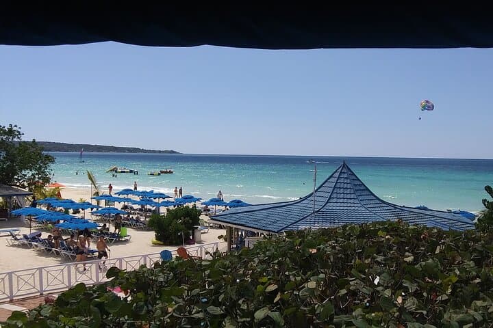 Experience the Vibrant Culture of Negril Beach and Rick's Cafe photo 2