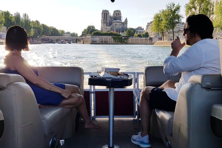 Private Seine River Cruise in Paris — 90-Minute Tour Past Louvre, Notre-Dame & Eiffel photo 2