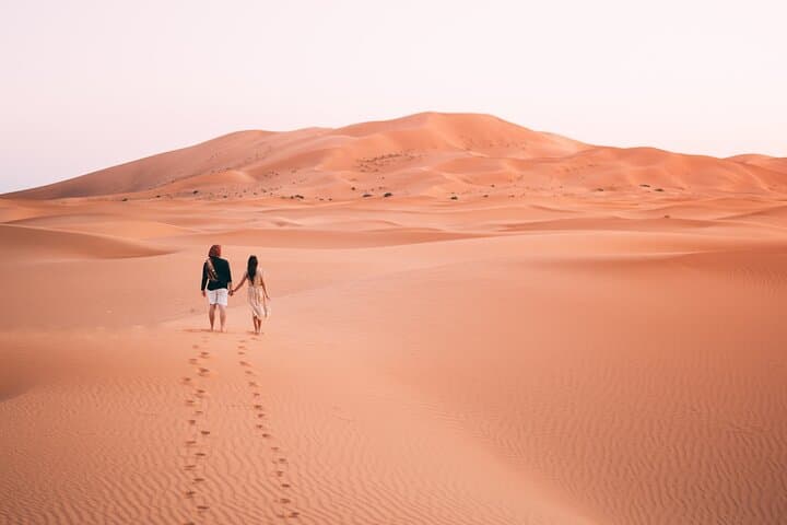 Morning Red Dune Desert Safari with Sandboarding & Camel Ride from Dubai
