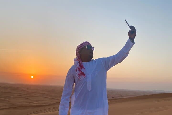 Red Dune Evening Safari: Quad Bikes, Camel Ride & Sunset BBQ in Dubai photo 3