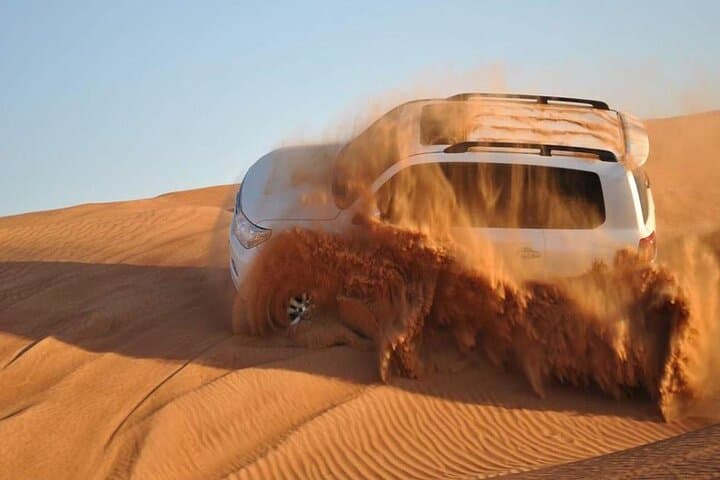 Dubai Red Sand Desert Adventure: Dune Bashing, Camel Rides & Sunset BBQ