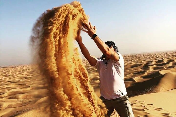 Morning Red Dune Desert Safari with Sandboarding & Camel Ride from Dubai photo 5