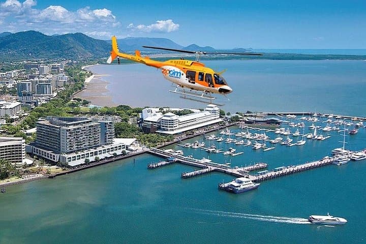 Helicopter Scenic Flight Over Cairns — 10-Minute City & Coast Aerial Tour photo 1