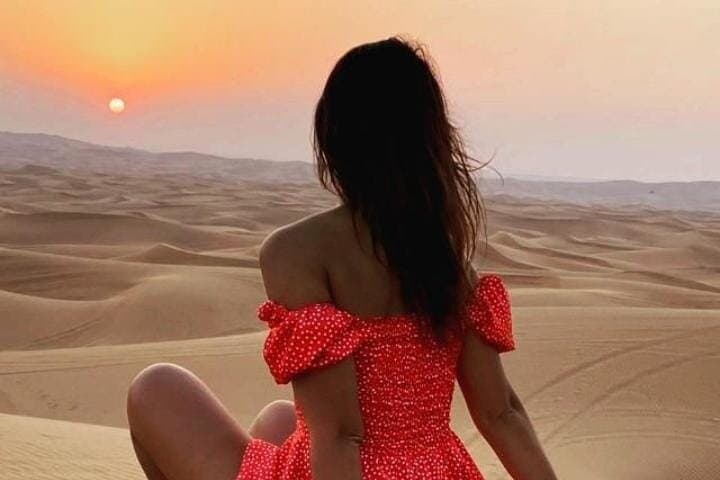 Dubai Desert Dune Drive: Sunset Sandboarding & Camel Ride Safari