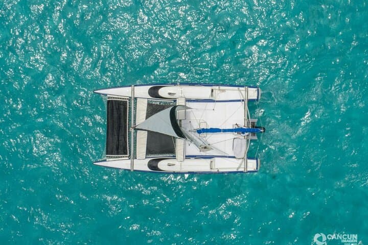 Private Catamaran to Isla Mujeres: Snorkel, Beach Club & Open Bar photo 1