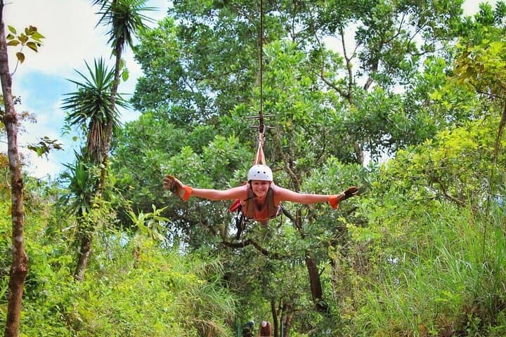 Arenal Full-Day Adventure: Canopy, Canyoning, Tarzan Swing & Class II–III Rafting photo 4