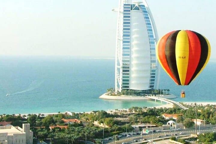 Dubai Desert Balloon Sunrise with Falcon Show and Camel Ride