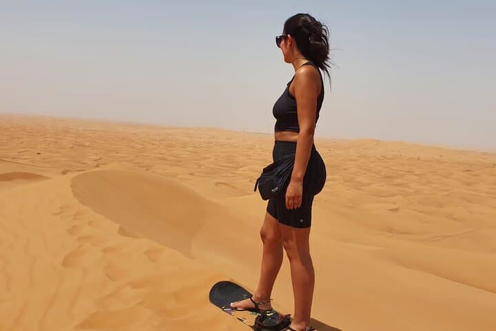 Red Dunes Desert Safari in Dubai: ATV, Dune Bashing, Camel & Cultural Camp Experience photo 2