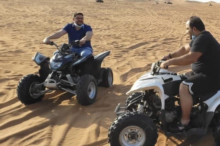 Red Dunes Desert Safari in Dubai: ATV, Dune Bashing, Camel & Cultural Camp Experience photo 3