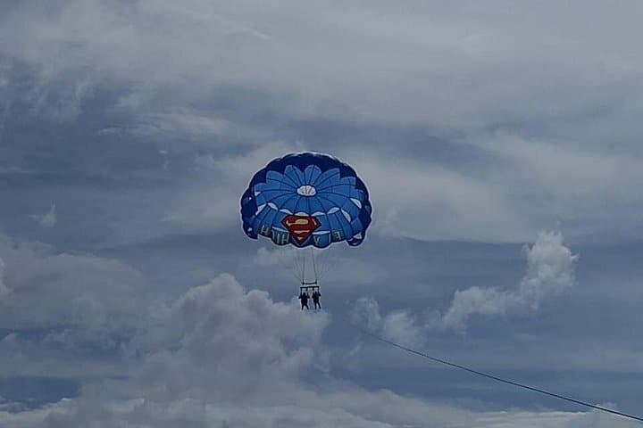 Parasailing and Blue Hole Mineral Spring at Seven Mile Beach — Negril Day Adventure photo 1