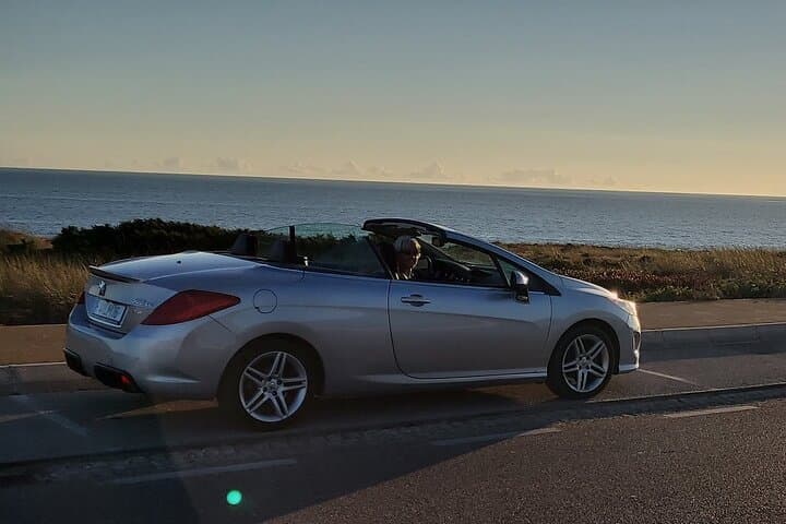 Open-Top Sunset Drive from Lisbon to Cabo da Roca with Strawberries & Pink Bubbly