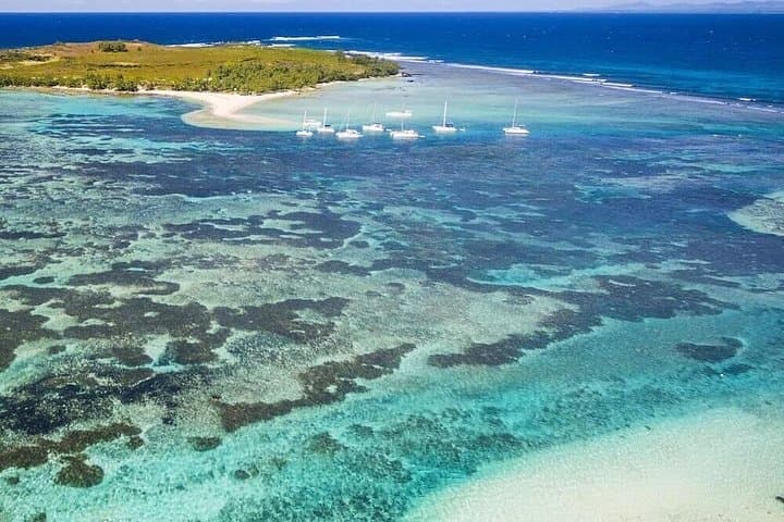 Private Speed Boat to Illot Gabriel, Coin de Mire & Flat Island — Full-Day Snorkel & BBQ from Grand Bay photo 2