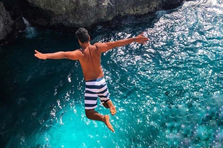 Experience the Vibrant Culture of Negril Beach and Rick's Cafe photo 4