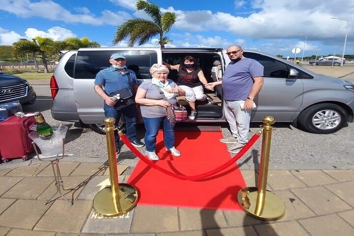 St. Maarten VIP Airport Transfer: Champagne Welcome, Johnny Cake & Chauffeured Service photo 3