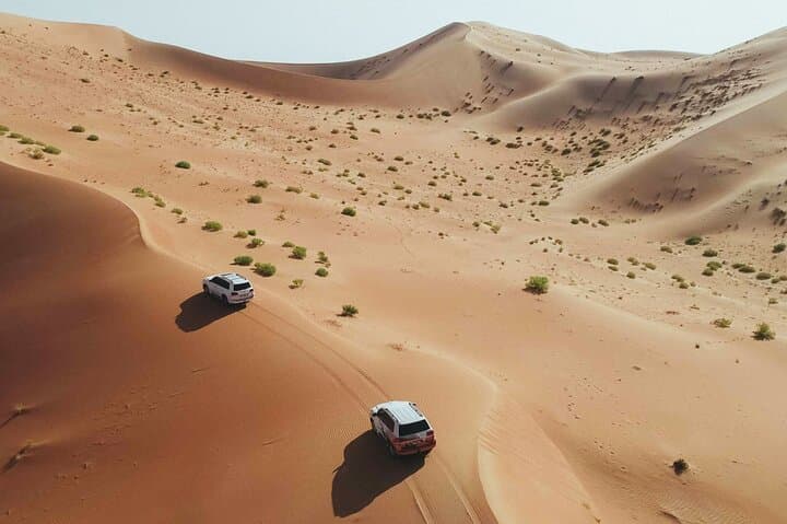 Red Dunes Desert Safari Dubai: Dune Bashing, Camel Rides & Dinner