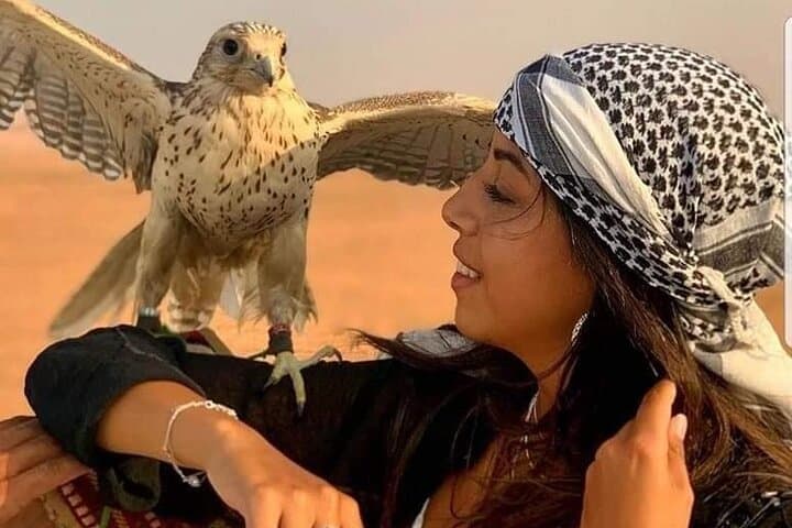 Dubai Red Dunes Desert Safari: Sunset BBQ, Camel Ride & Sand-Boarding Experience photo 4