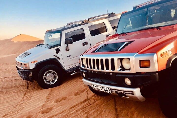 Morning Hummer Desert Safari Dubai: 4-Hour Dune Bashing, Camel Ride & Sandboarding