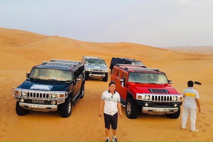 Morning Hummer Desert Safari Dubai: 4-Hour Dune Bashing, Camel Ride & Sandboarding photo 3